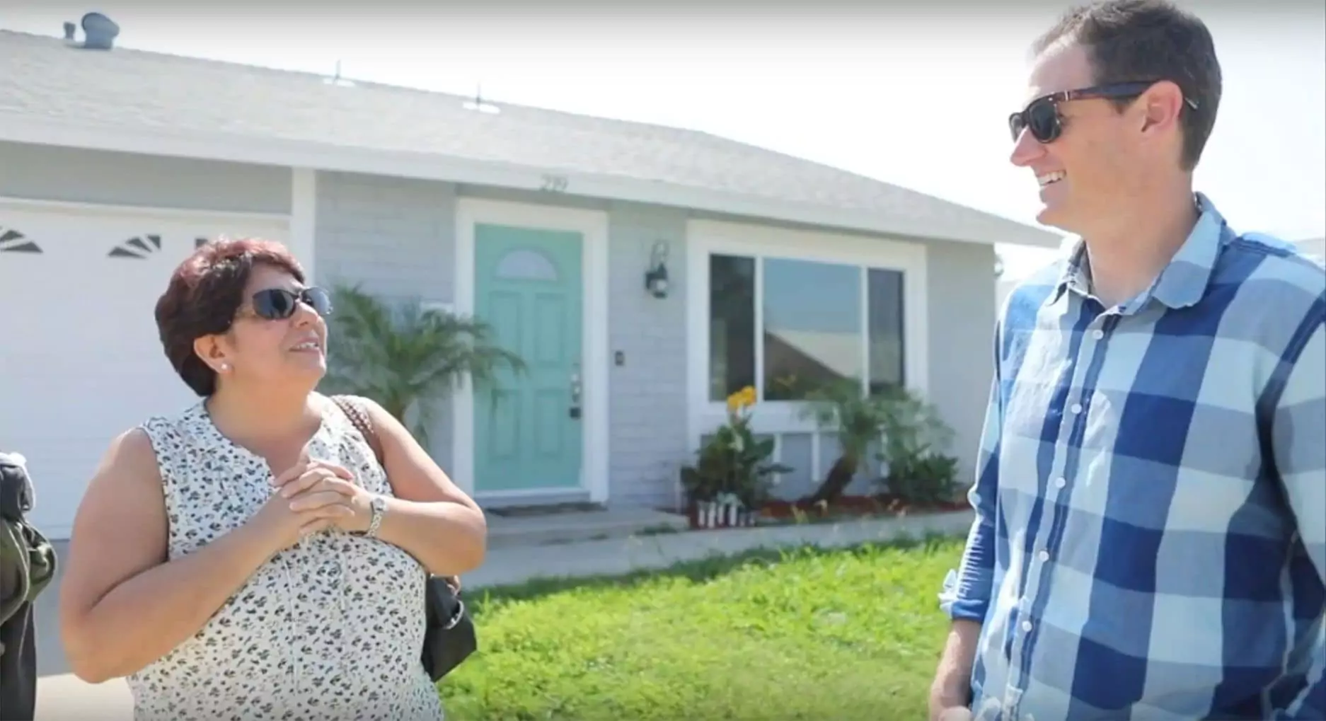 Isabel speaking with Doug Van Soest outside her Anaheim home