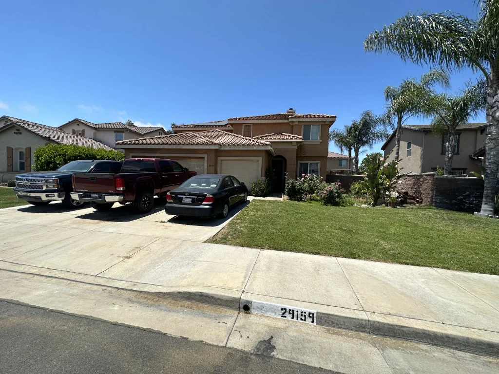 Front exterior of the two-story Woodbine Lane home in Menifee before our July 2023 purchase.