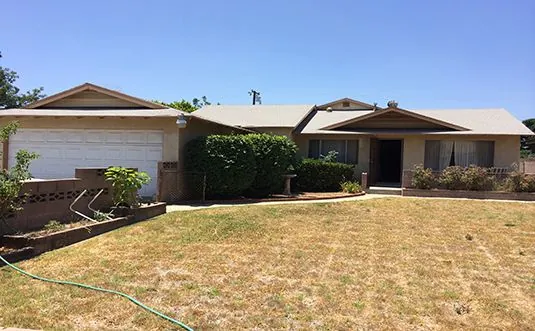 Front exterior and yard of the Ramona Avenue home in Rancho Cucamonga.